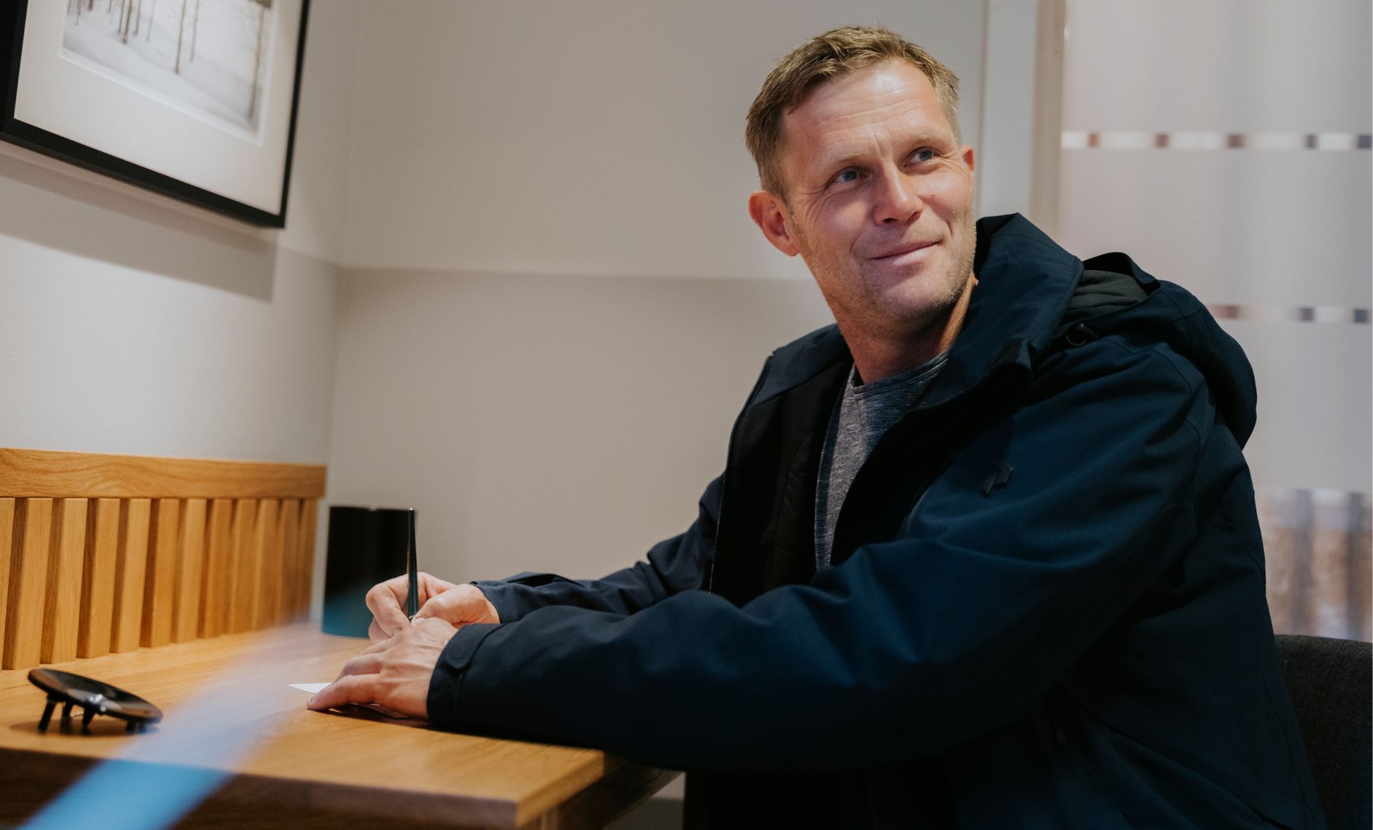 Happy man at table